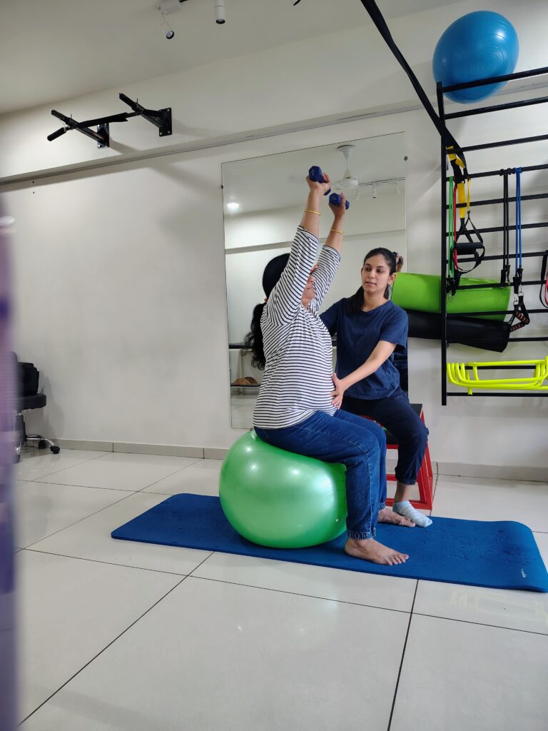 Athlete performing early isometric knee exercise under sports physio supervision