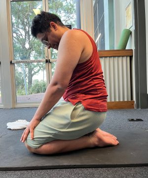 Injured athlete using stationary bike as part of active rest rehab program